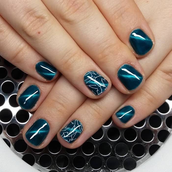 teal cat eye nail design