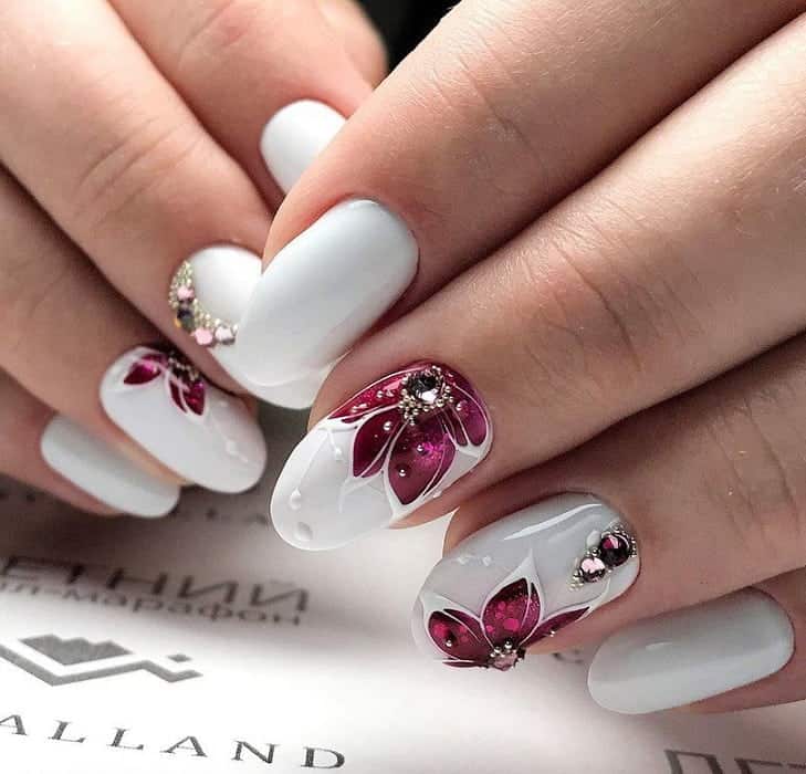 white and burgundy nail design