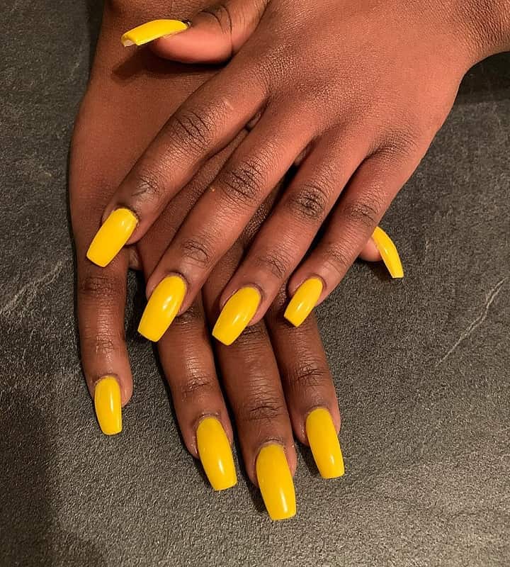 yellow nails on dark skin