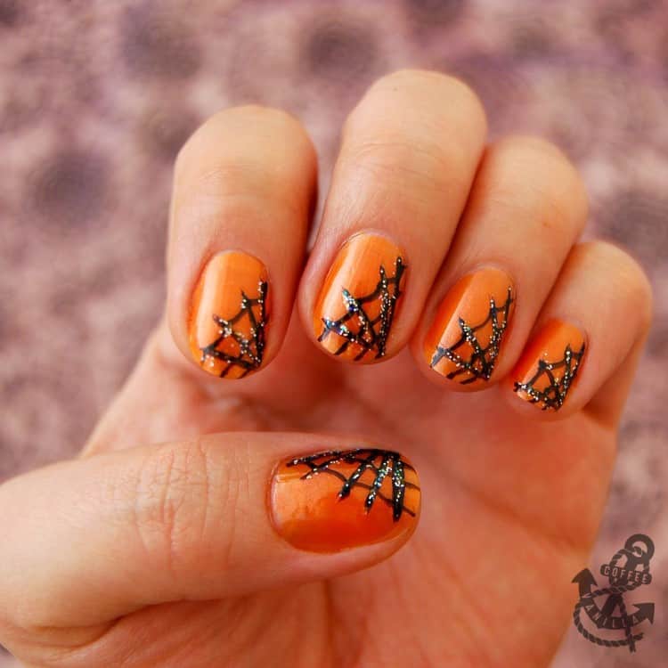 spider web pumpkin nail art