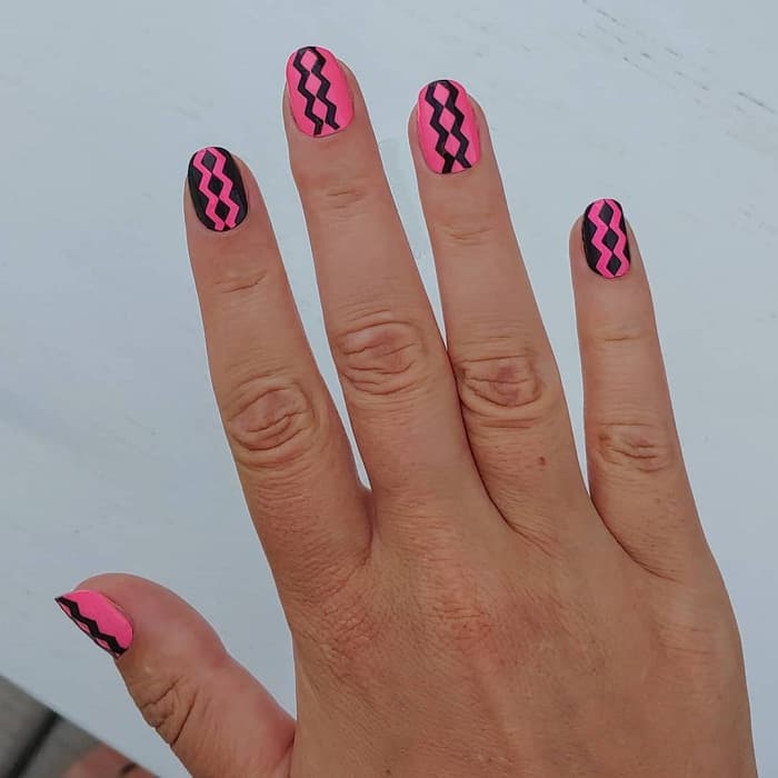 old school pink and black nail desgn