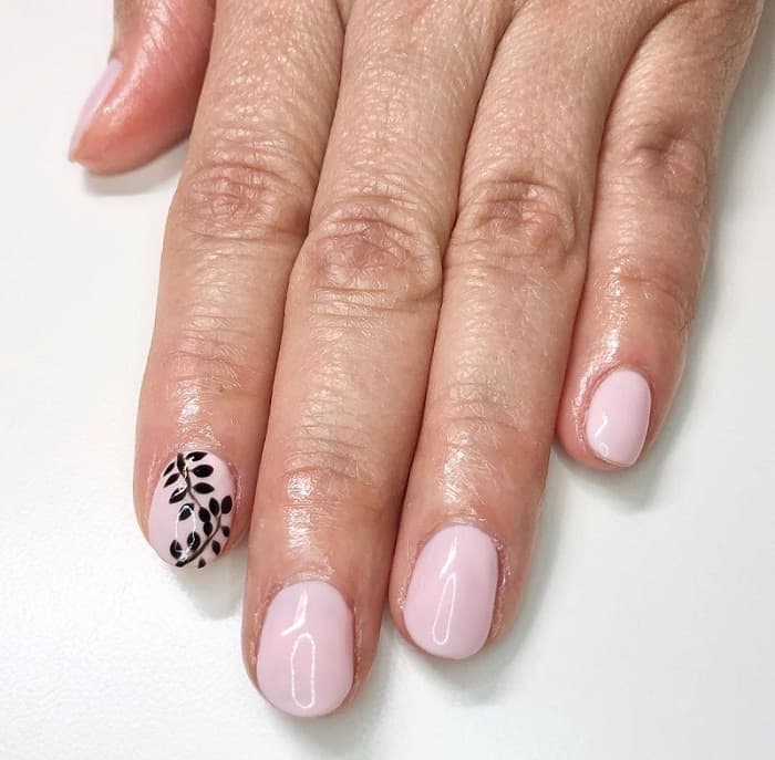 pale pink and black nail design