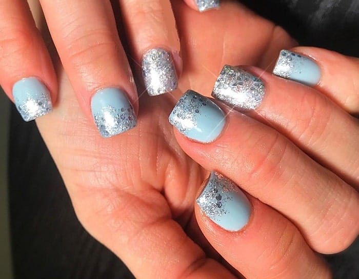 baby blue nails with silver glitter 