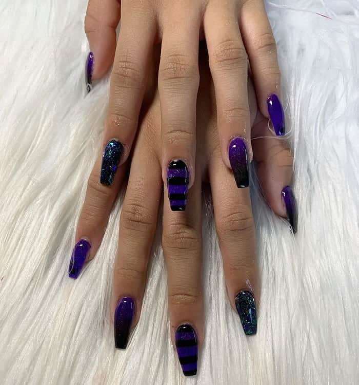 coffin shaped black and purple nails