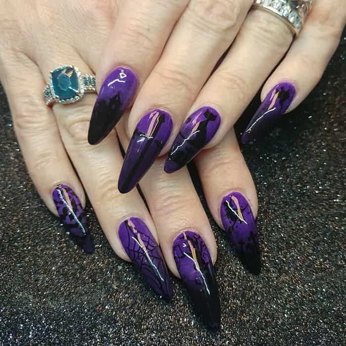 black and purple halloween nails 