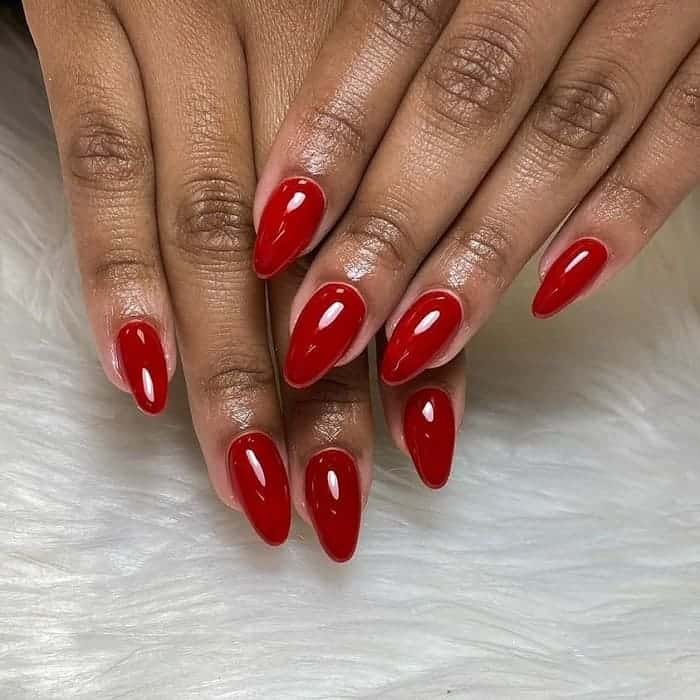 dark red nails on dark skin