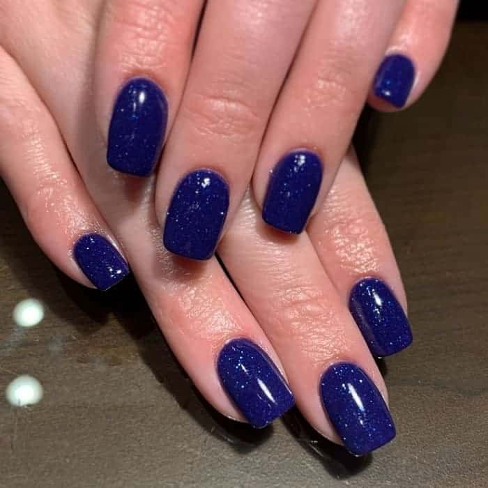 navy blue nails with glitter