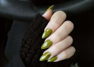 Long, almond-shaped nails in a vibrant olive green.