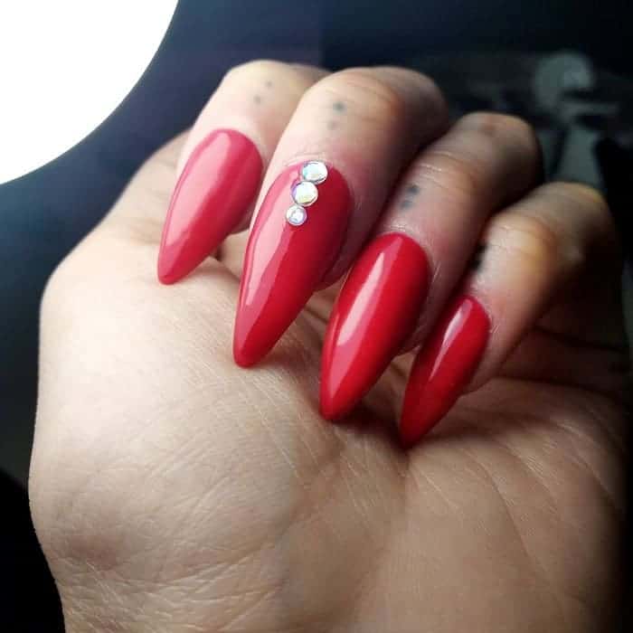 red stiletto nails with diamonds