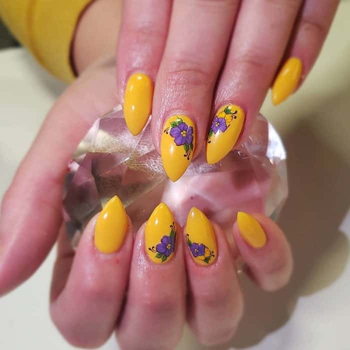 yellow floral nail design 