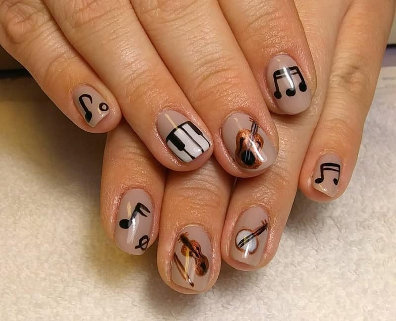 music notes on acrylic nails