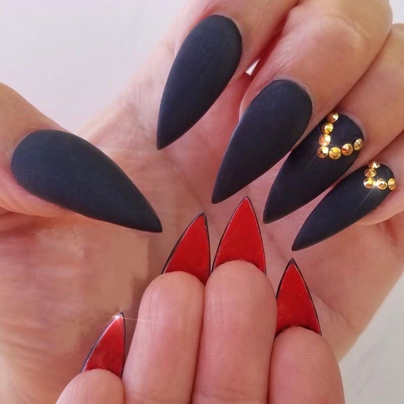 matte stiletto black nails with rhinestones