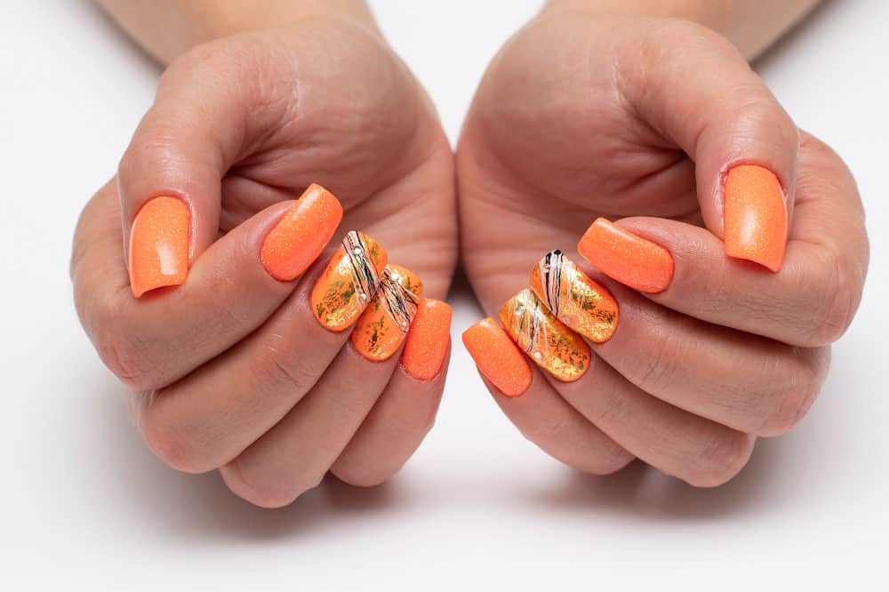 Bright Orange Nail Color for Tan Skin