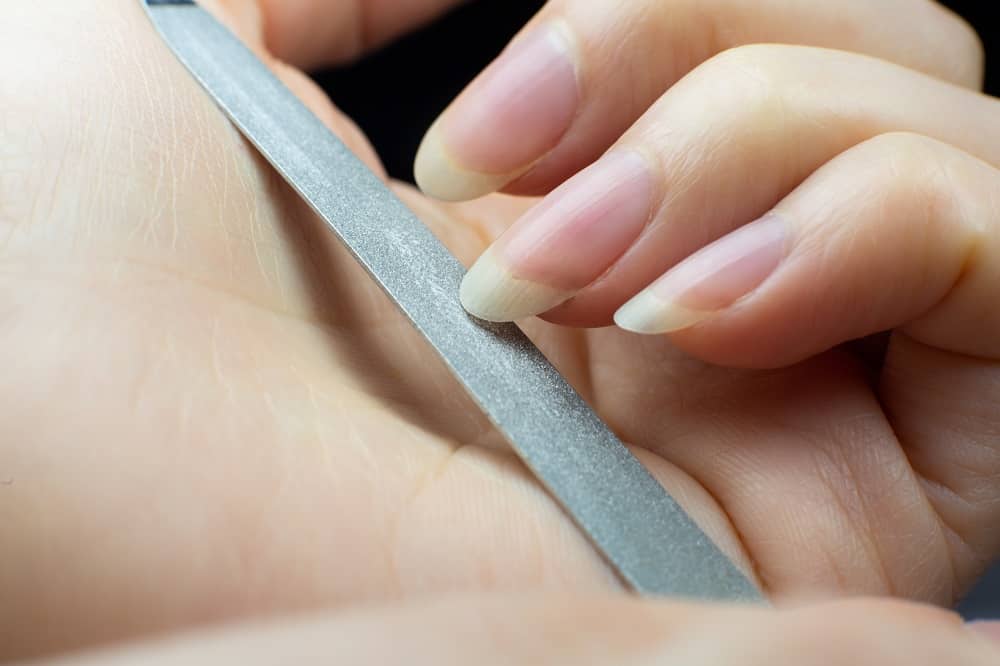 Ways To Fix Fanned Nails - File Into an Oval Shape