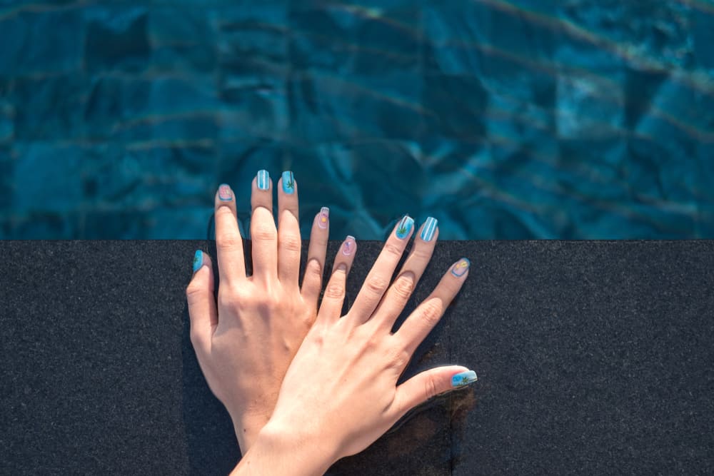 Can you swim with fake nails