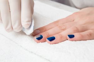 Nail shape: almond, length: medium, color palette: deep blue, matte finish, nail art: simple.