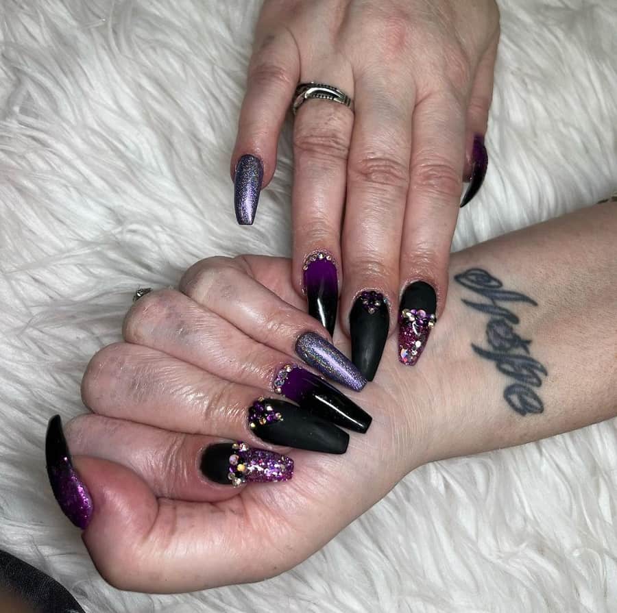 black and purple nails with rhinestones