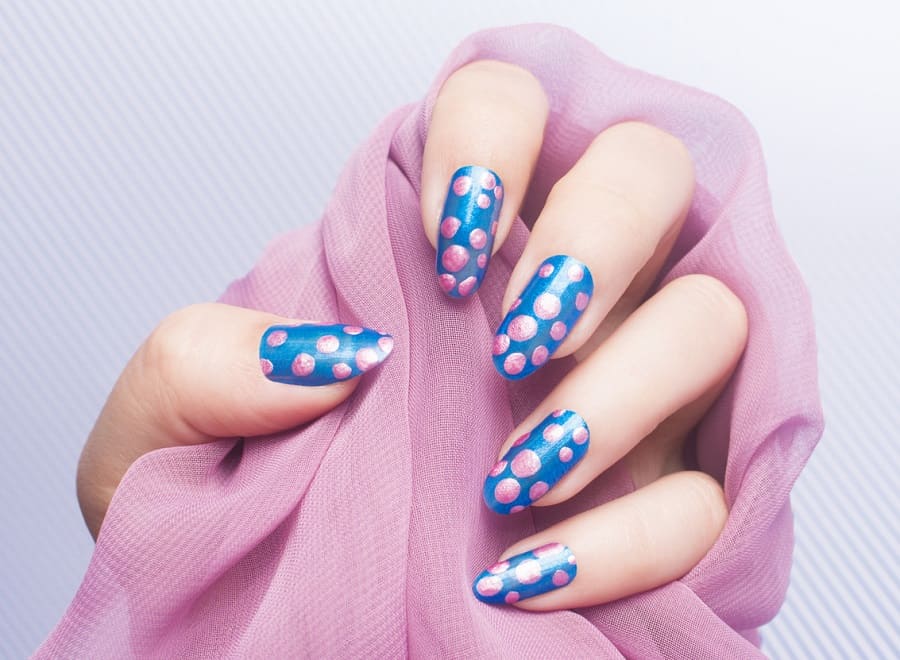 blue and pink polka dot nail design