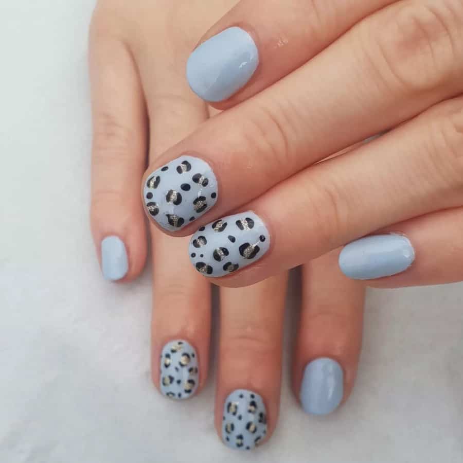 light blue nails with leopard print