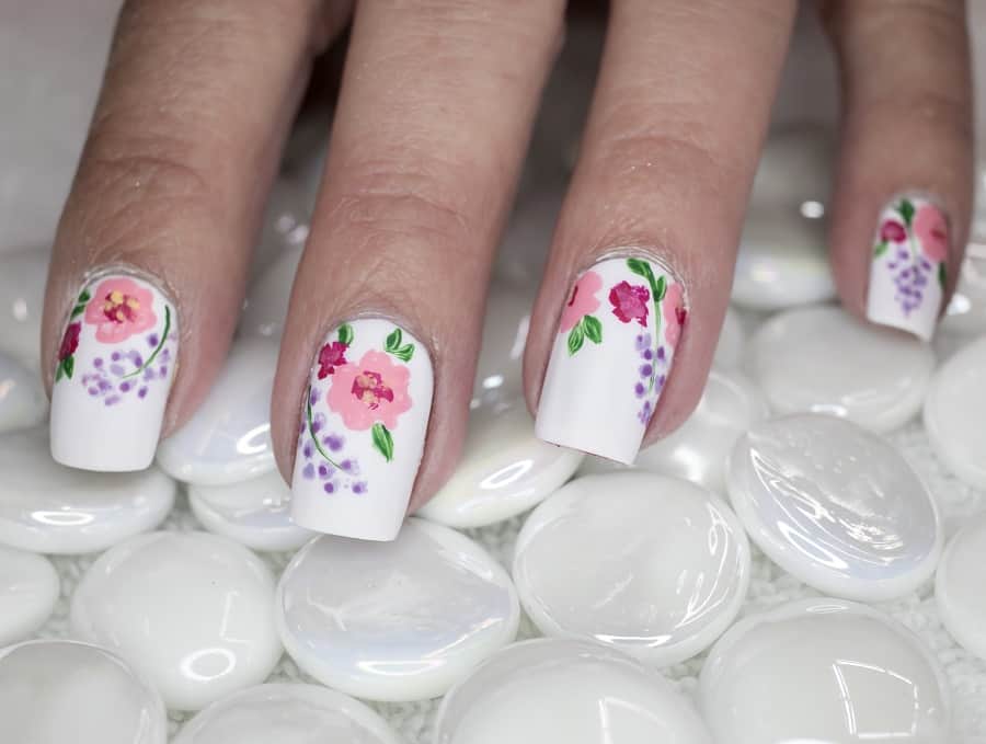 pink and white nail with flowers
