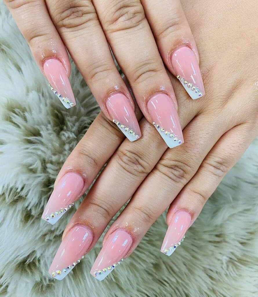 pink and white nails with diamonds