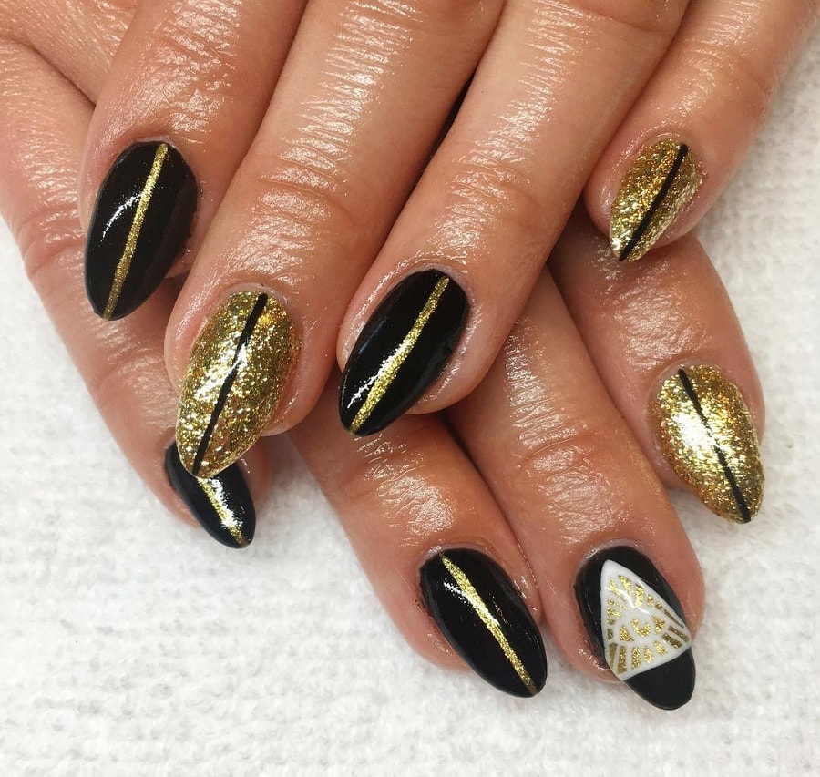 black and gold egyptian nails
