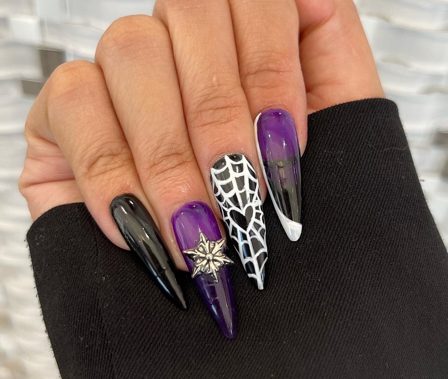 black and purple stiletto nails