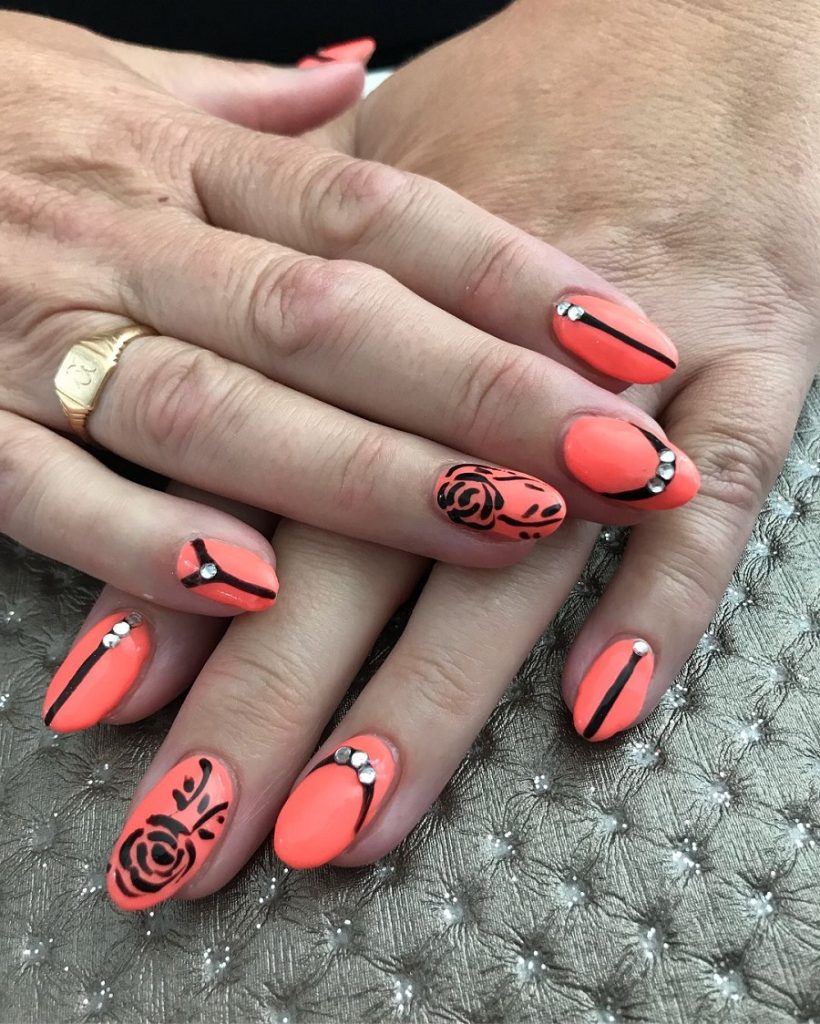 coral and black nail design