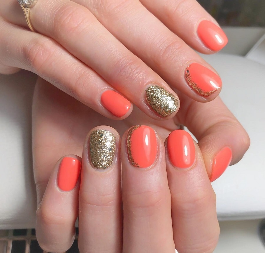 coral and gold nail design