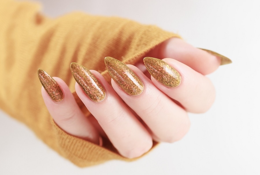 dark mustard nails with glitter