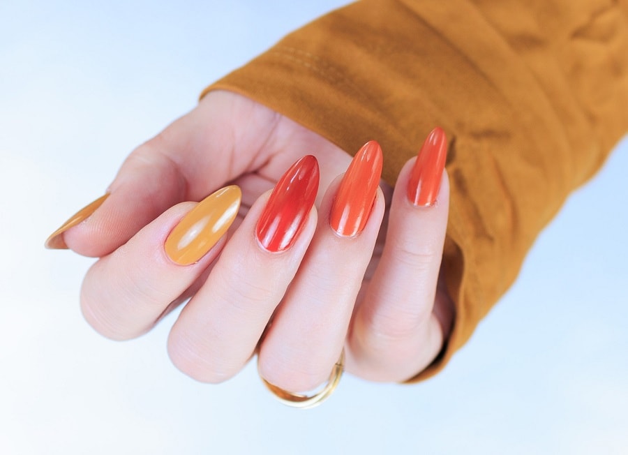 long mustard yellow and red nails