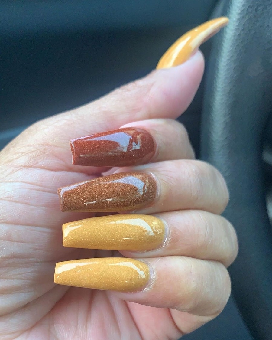 mustard and brown fake nails