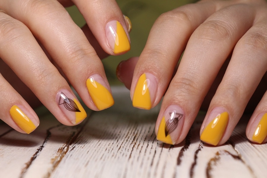 mustard gel nails with design