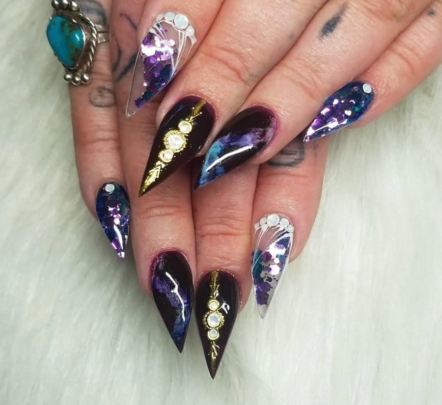 purple stiletto nails with jewels