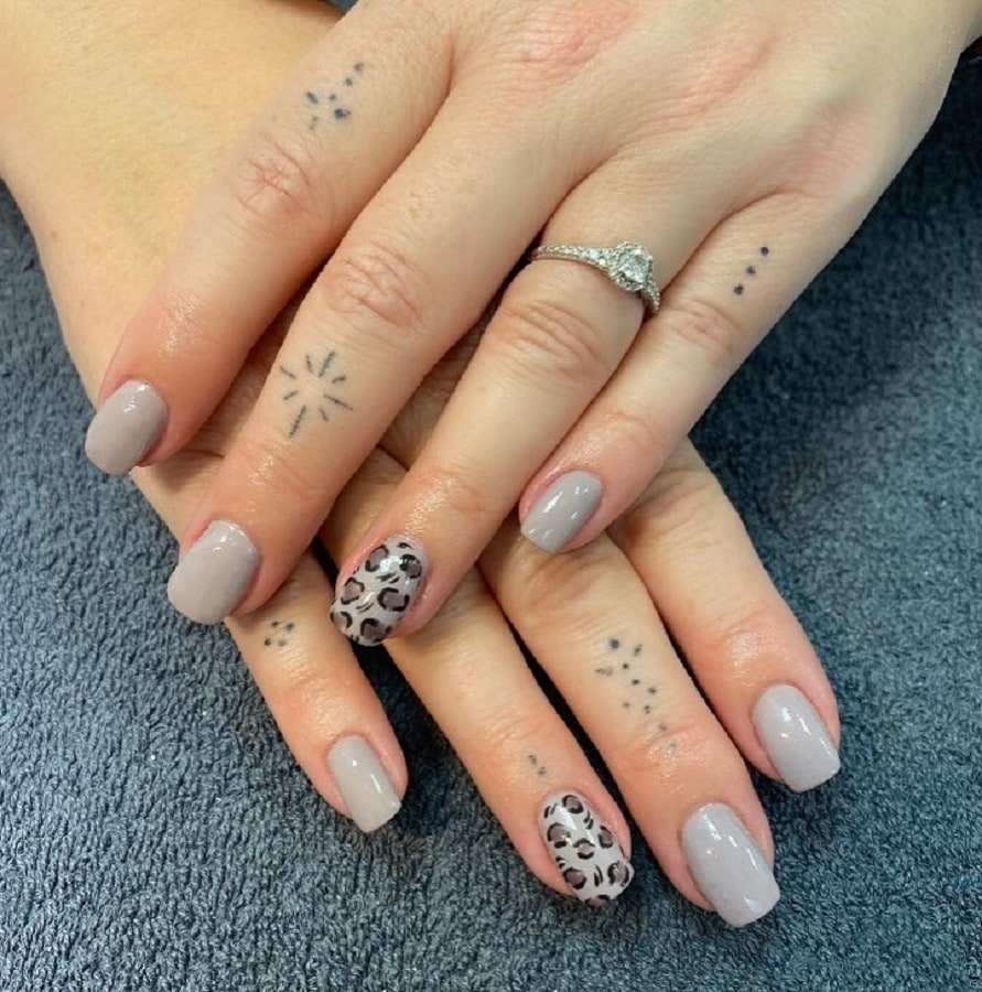 taupe nail with animal print