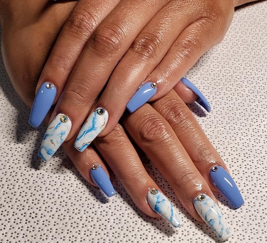 light blue coffin nails on dark skin