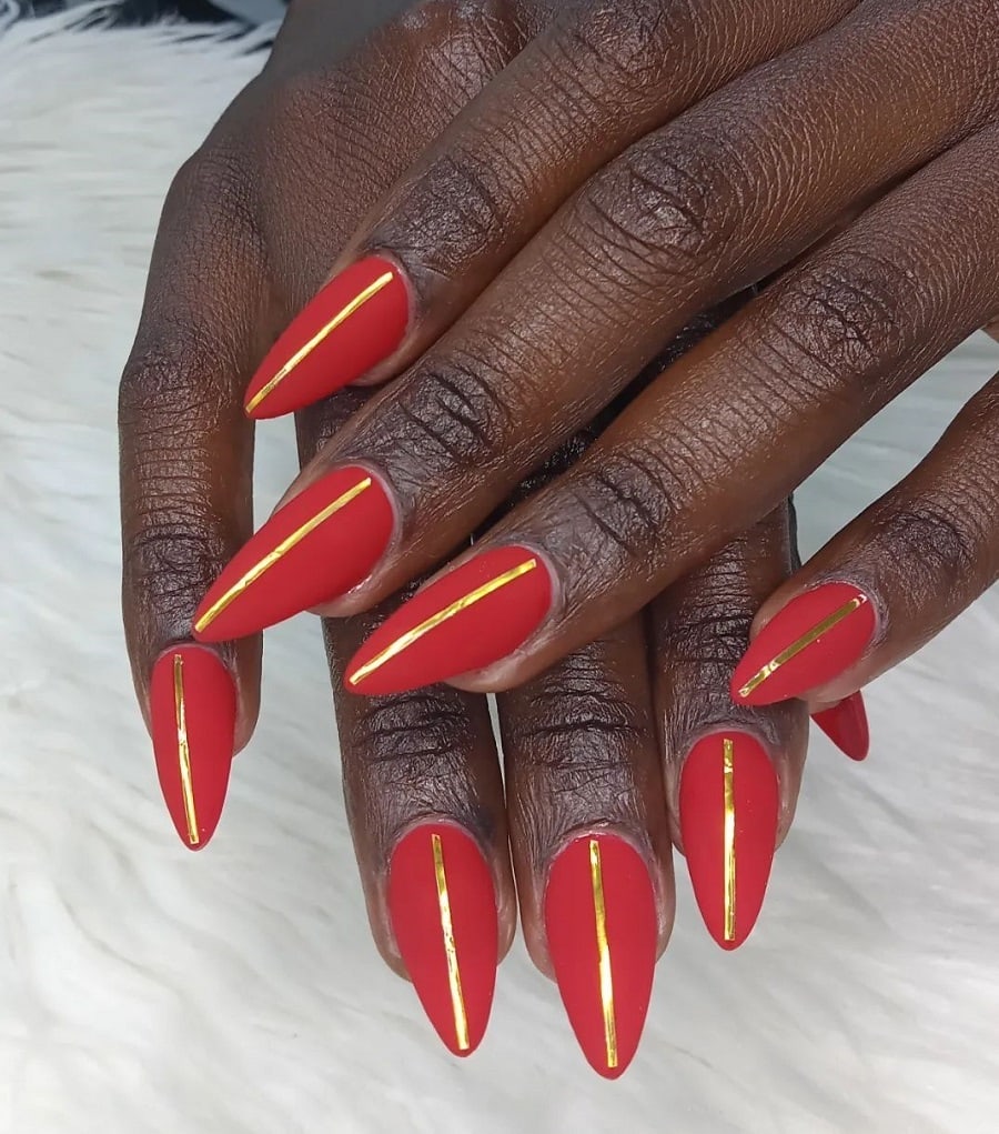 orange red nails on dark skin