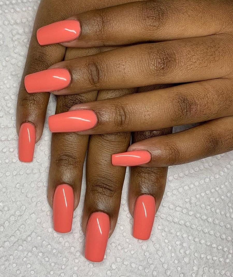 peach color gel nails on dark skin