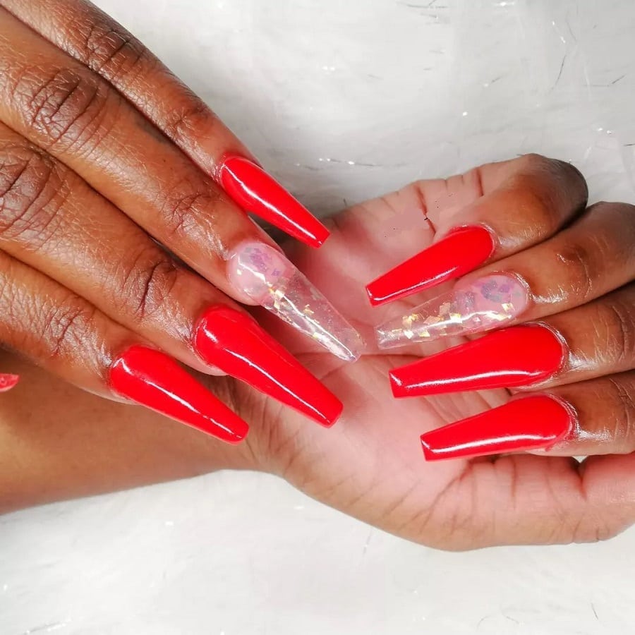 red coffin nails on dark skin