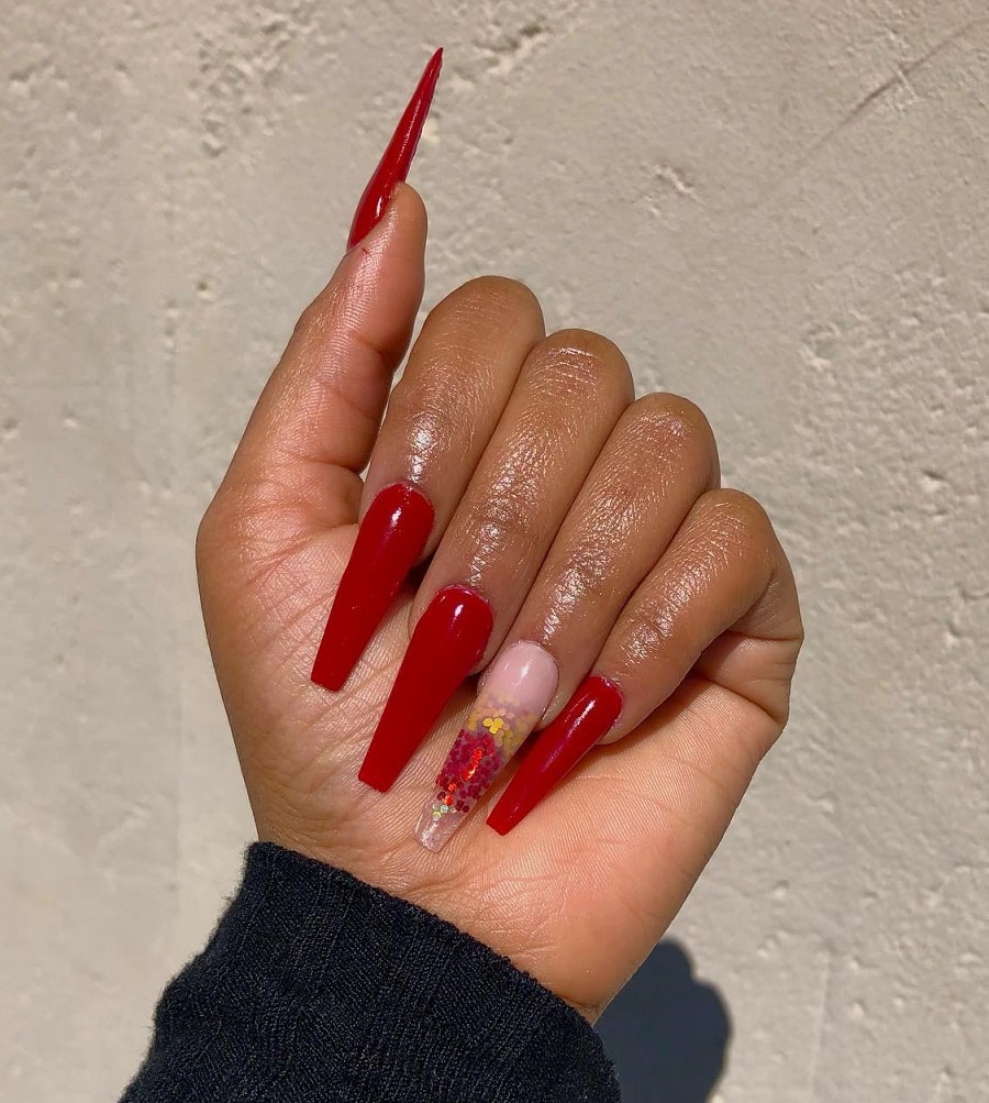 red coffin nails on dark skin