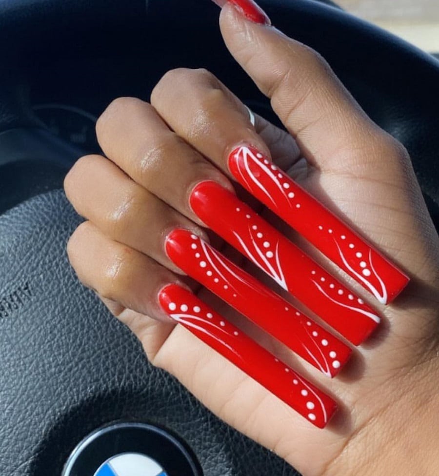 red long nails on dark skin