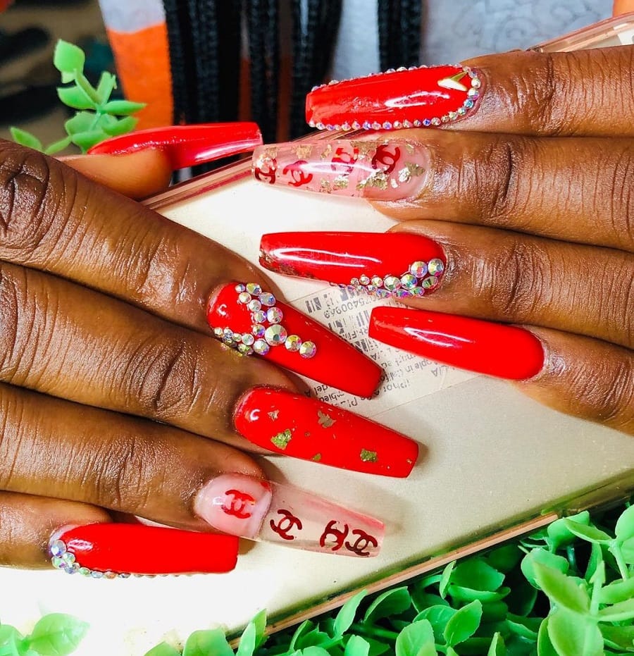 red luxury nails on dark skin