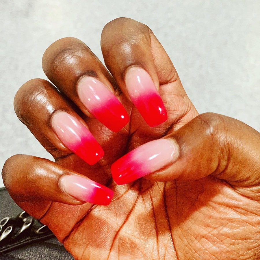red ombre nails on dark skin