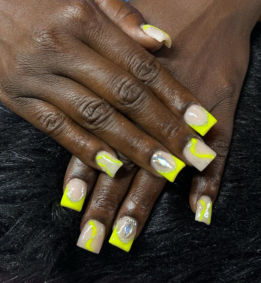 yellow french tip nails on dark skin
