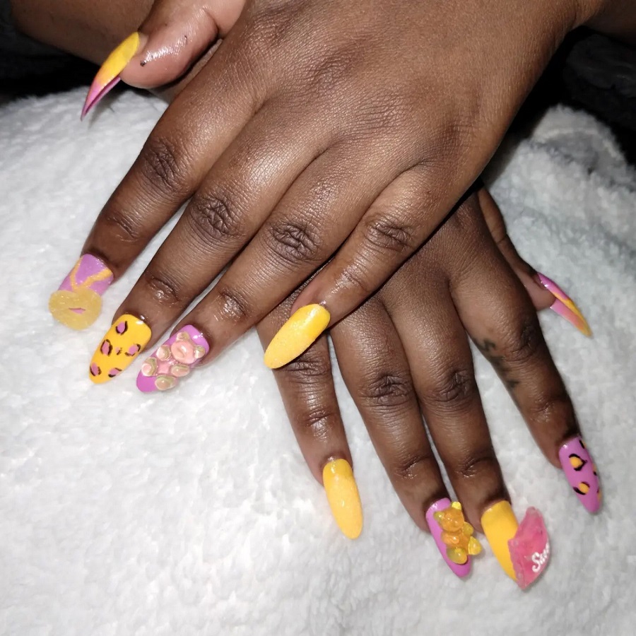 yellow nail design on dark skin