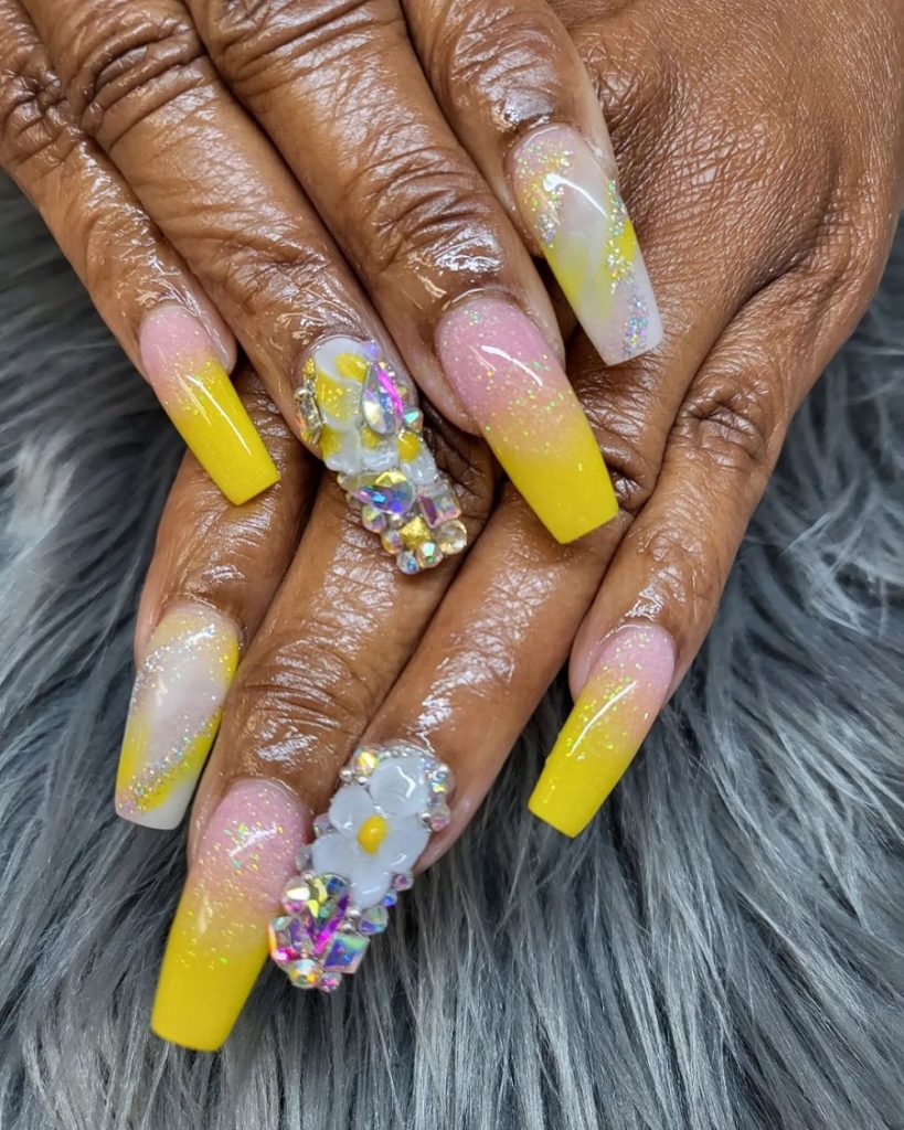 yellow nails with rhinestones on dark skin
